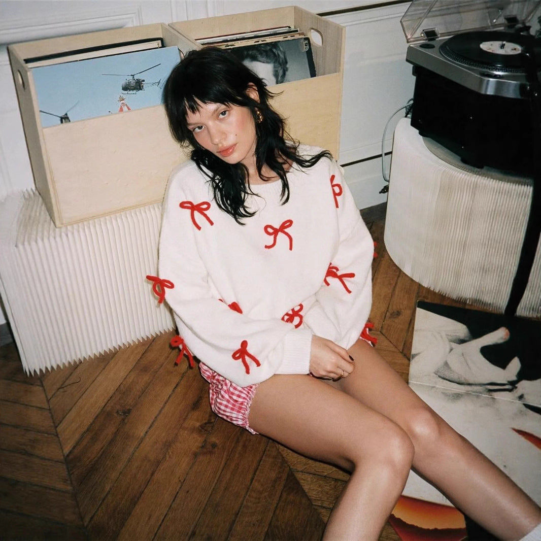 Pull femme avec des éléments de nœud décoratifs et une coupe moderne Chic und Stil