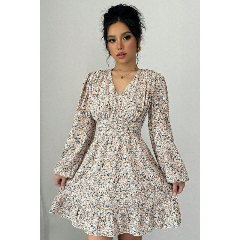 Robe mini ornée de fleurs pour femmes avec décolleté en V profond et manches volumineuses Chic und Stil