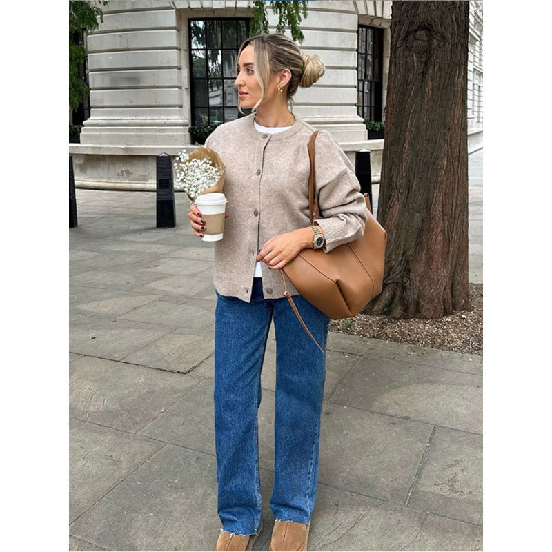 Womens knitted jacket with comfortable design featuring practical buttons Chic and Style