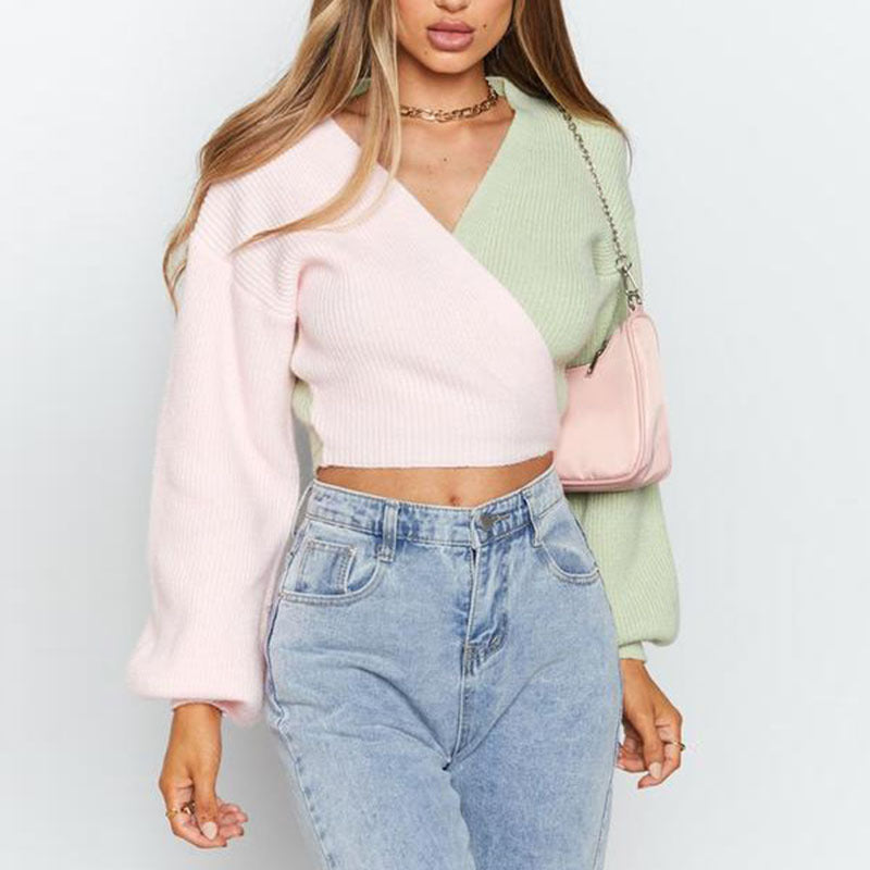 Dames Pull élégant à col en V avec des manches contrastées et une surface texturée Chic und Stil