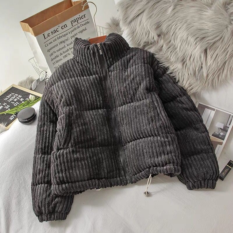 Quilted women's jacket with high collar and ribbed design Chic and Style