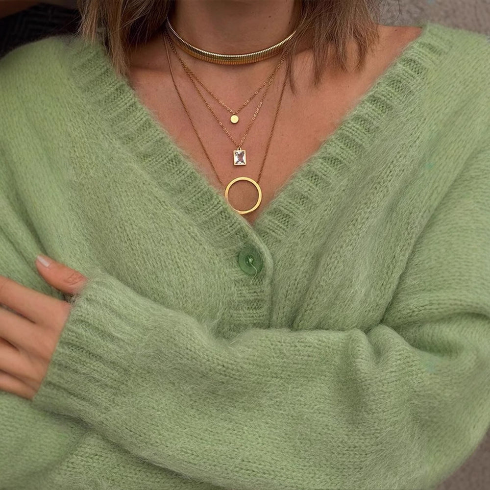 Cardigan pour dames en tricot doux avec décolleté en V et détails de boutons Chic und Stil