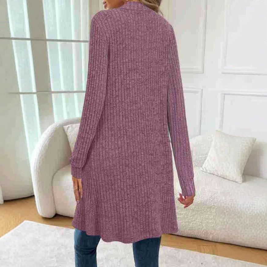 Veste tricotée longue pour femmes avec poches latérales et design texturé Chic und Stil