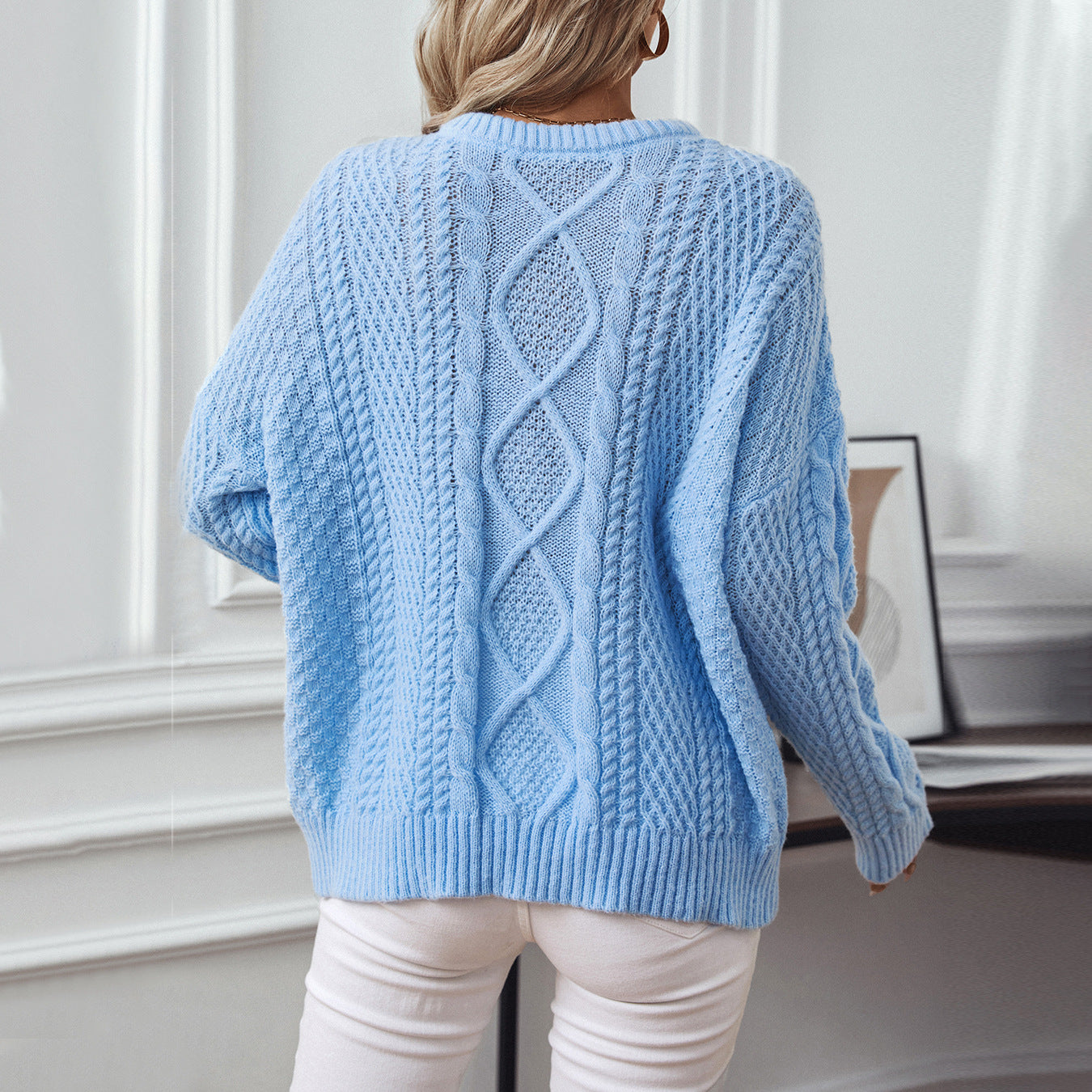 Pull en tricot pour femmes avec design en torsades texturées et col rond Chic und Stil