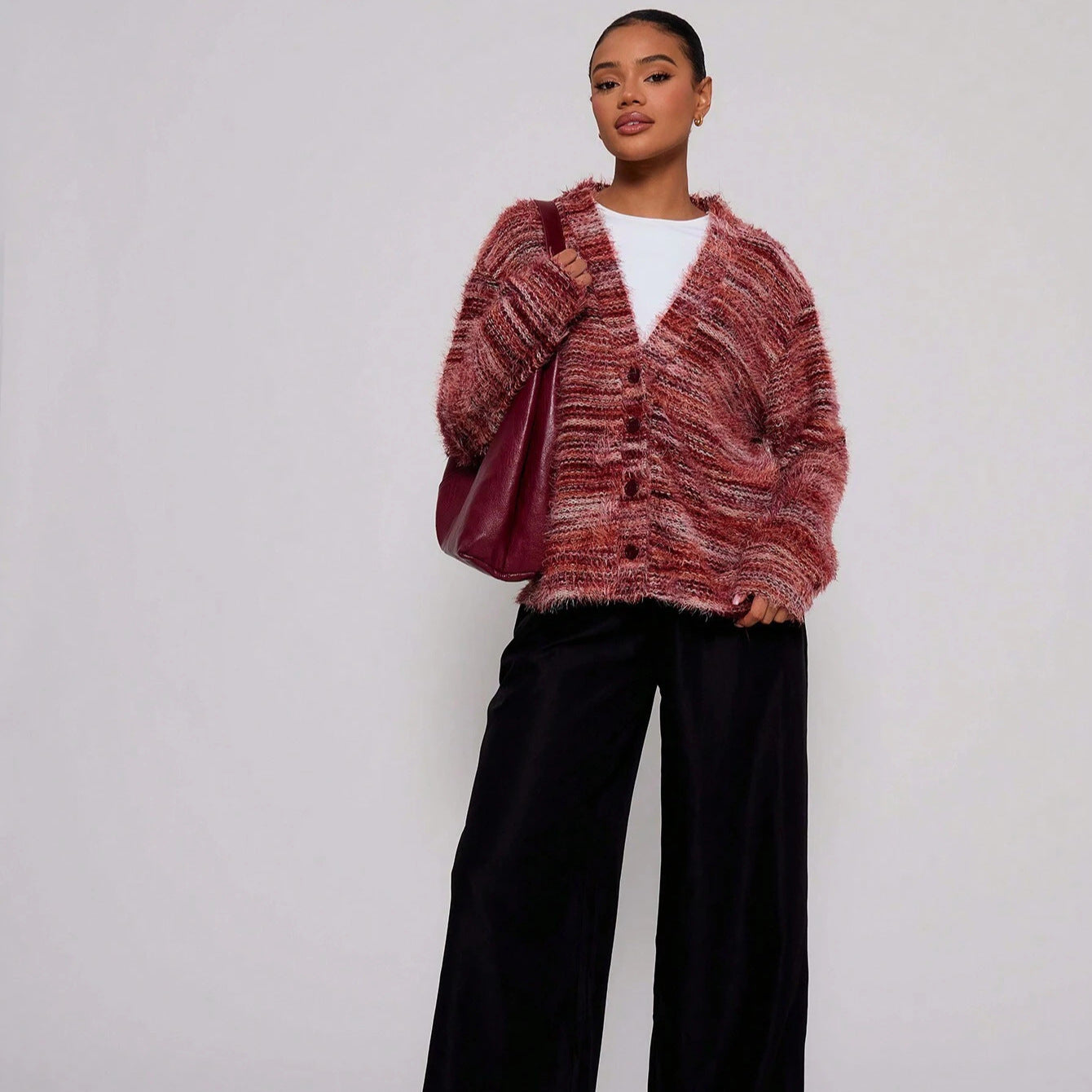 Dames Pull-over en peluche avec décolleté en V profond et coupe ample Chic und Stil