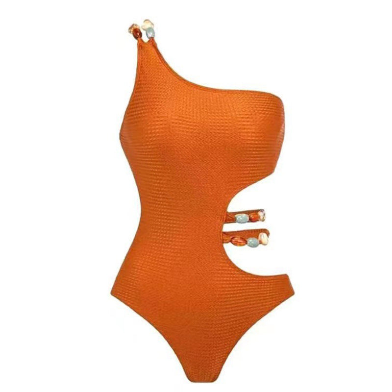 Maillot de bain une pièce pour femme avec découpes raffinées et jupe élégante Chic und Stil