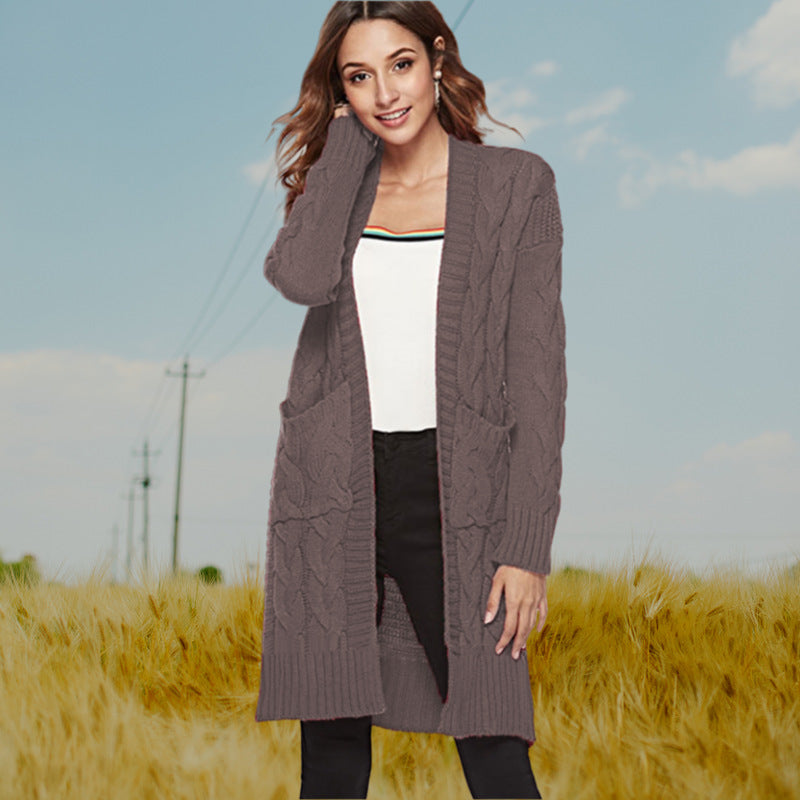 Cardigan en gros tricot pour femmes avec un élégant design en torsade et des poches pratiques Chic und Stil