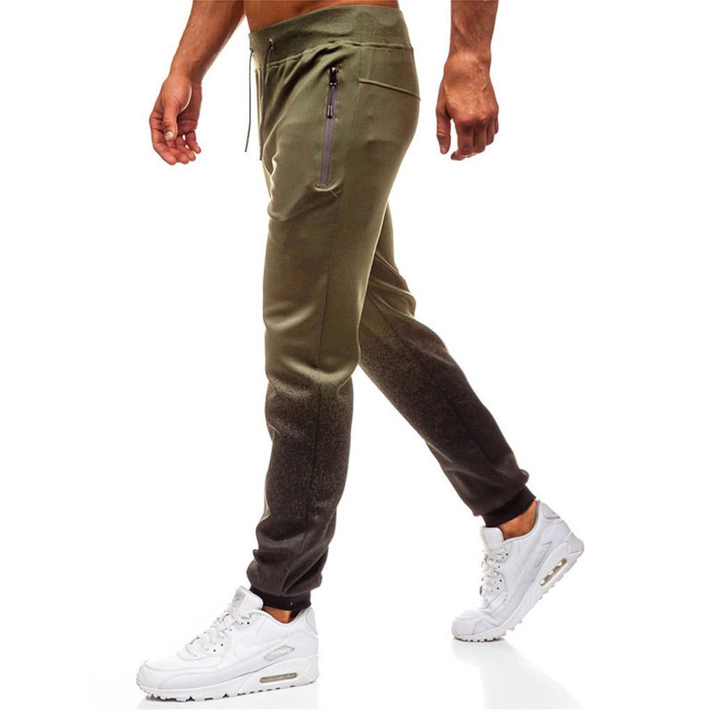 Pantalon de jogging sportif pour hommes avec dégradé de couleurs raffiné et poches à fermeture éclair pratiques Chic und Stil