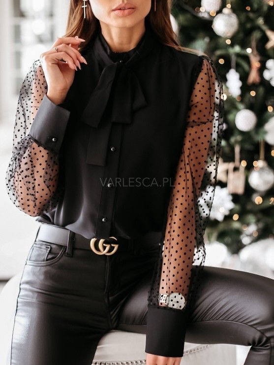 Elegant women's blouse with sheer sleeves Chic und Stil