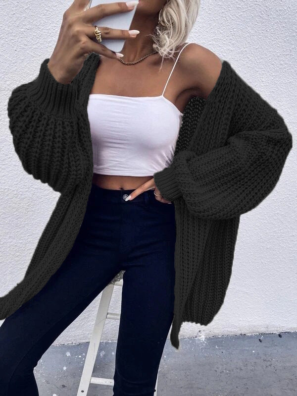 Thick knit cardigan for women with voluminous sleeves and a front opening Chic und Stil