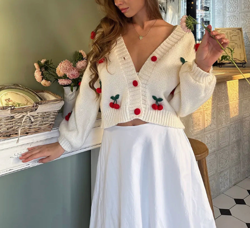 Dame cardigan avec design floral brodé et bord côtelé Chic und Stil