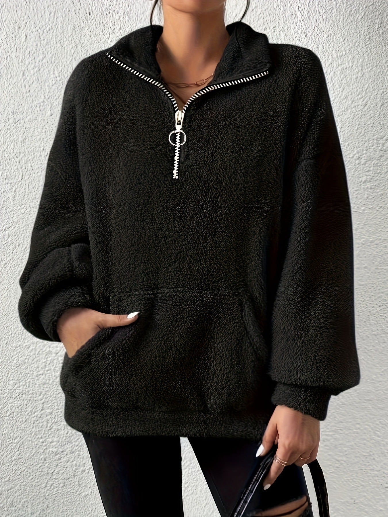 Pull en polaire douillet pour femmes avec demi-fermeture éclair et poches latérales Chic und Stil