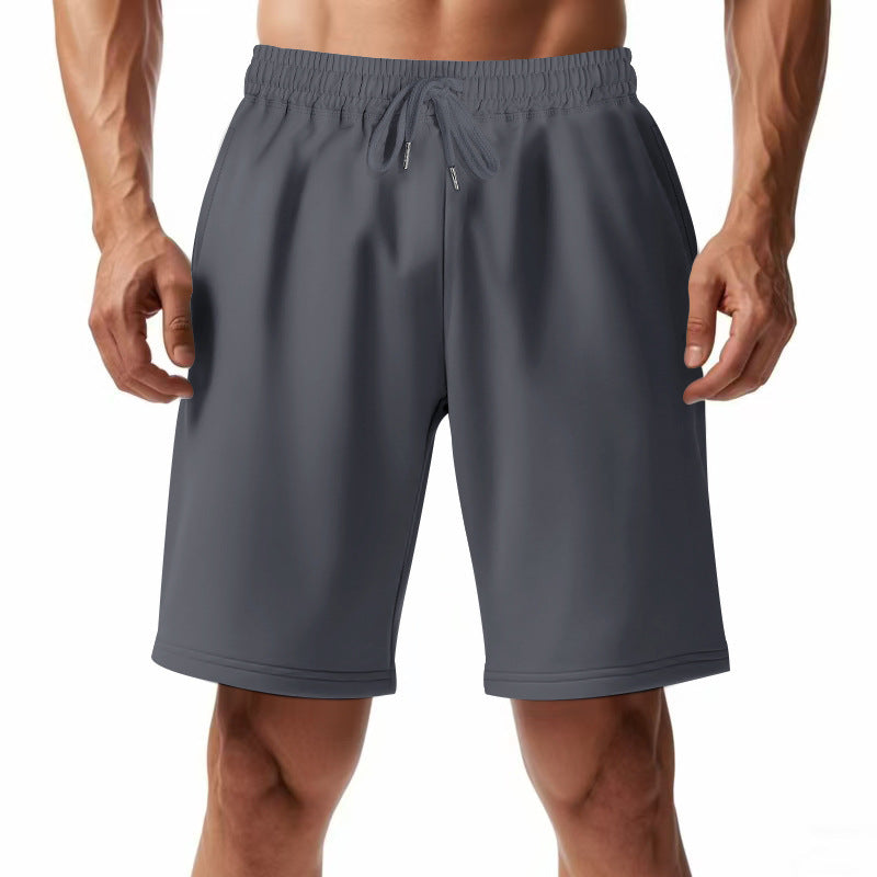 Pantalons de sport respirants pour hommes avec taille élastique et poches latérales Chic und Stil