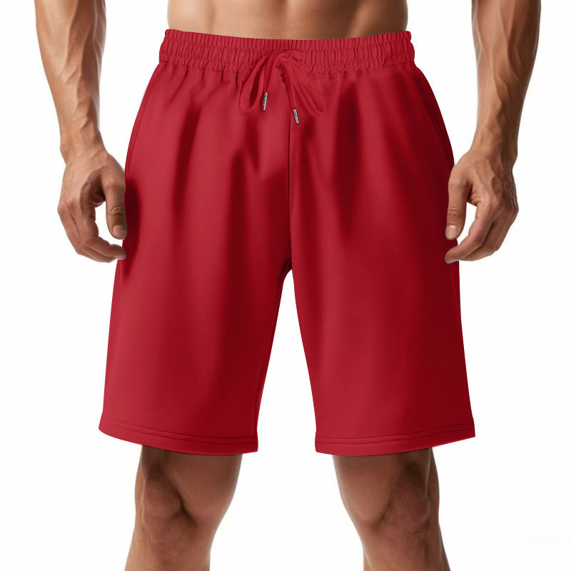 Pantalons de sport respirants pour hommes avec taille élastique et poches latérales Chic und Stil