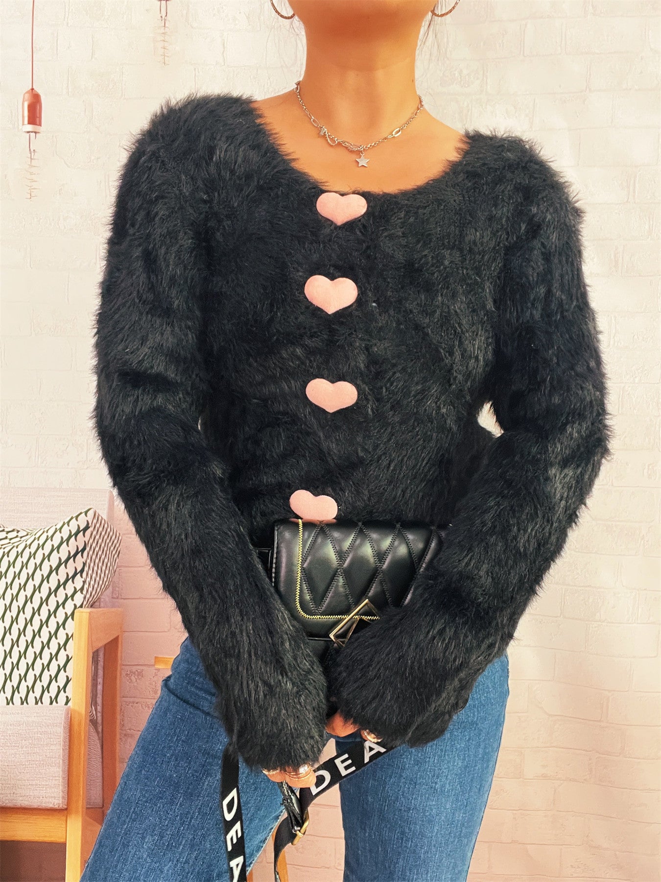 Pull en tricot confortable pour femmes avec boutons en forme de cœur Chic und Stil