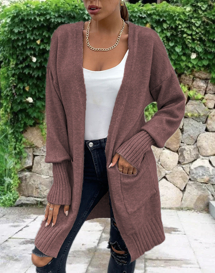 Cardigan en tricot pour femmes avec une coupe décontractée et de grandes poches Chic und Stil