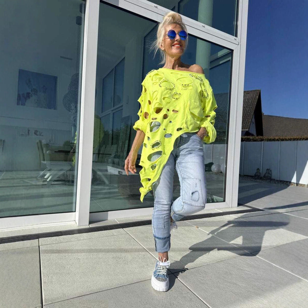T-shirt oversized pour femmes avec des détails de déchirure tendance et une coupe décontractée Chic und Stil