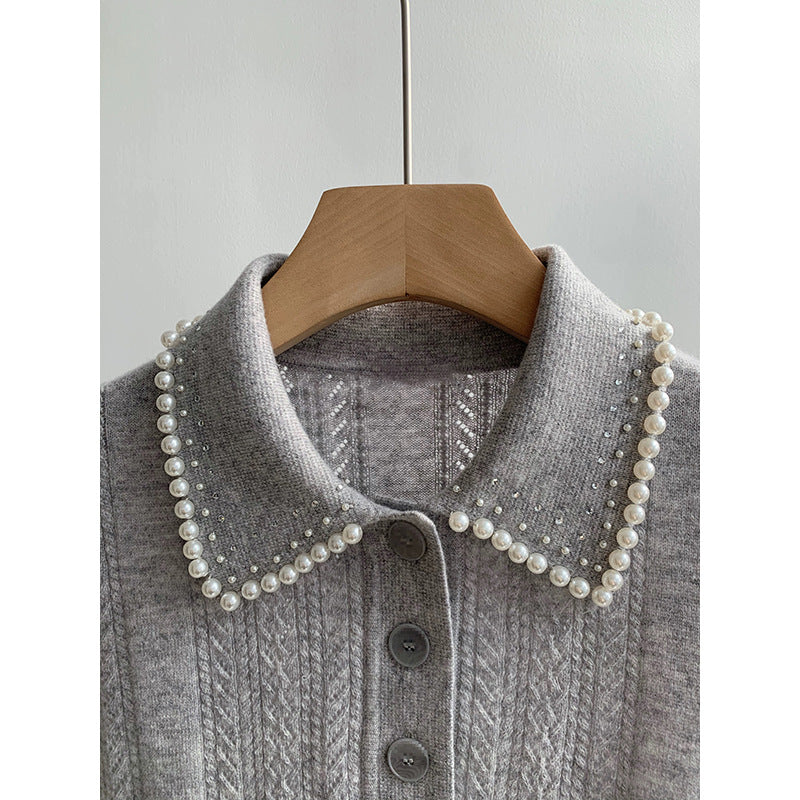 Top polo en tricot texturé pour femme avec détail en perles Chic und Stil