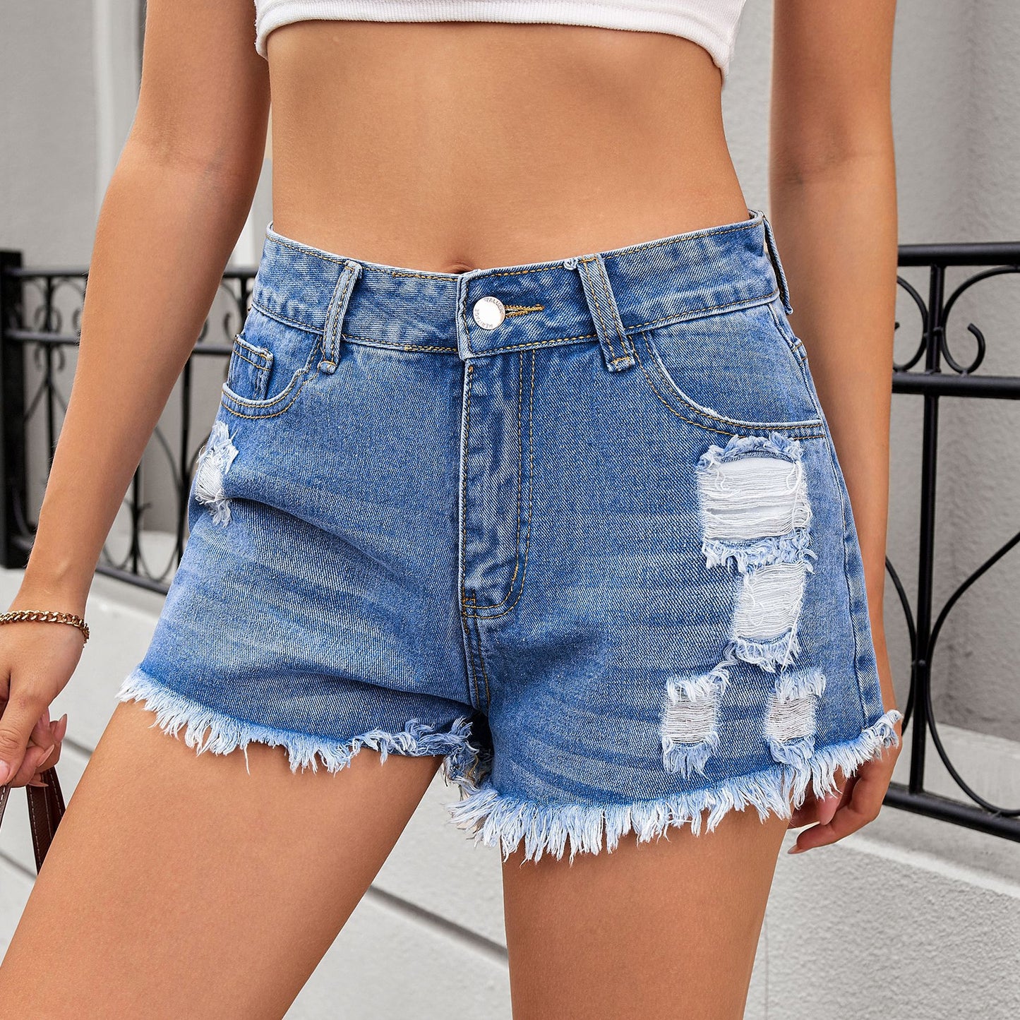 Women's Ripped Denim Shorts with Fringes and High Waist Chic and Style