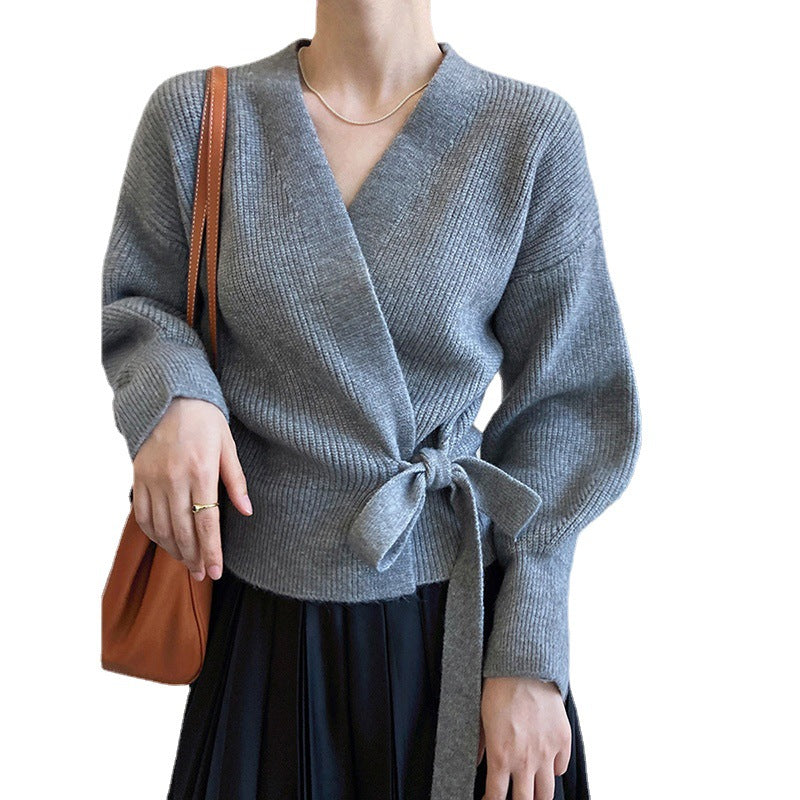 Pull en tricot à enroulement pour femmes avec ceinture à la taille et manches raglan Chic und Stil