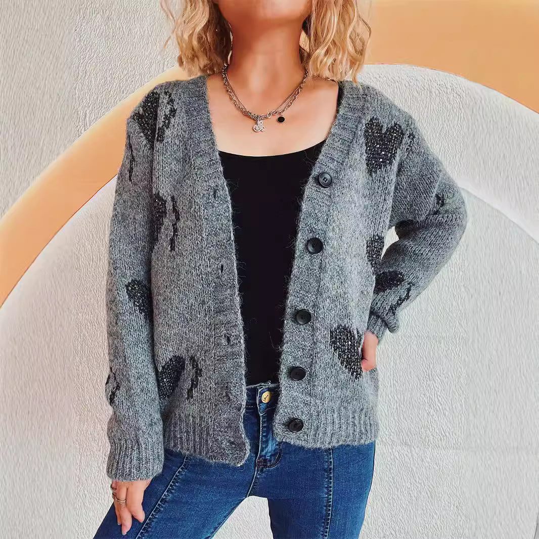 Cardigan en tricot pour femmes avec motif en forme de cœur et détails de boutons Chic und Stil