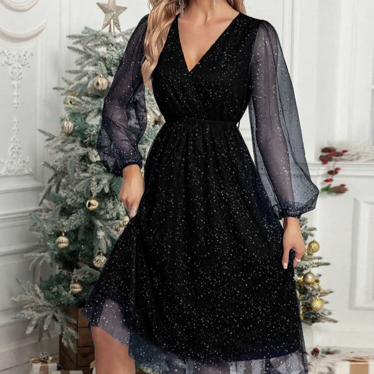 Robe midi glamour pour femmes avec des manches bouffantes transparentes et un motif de sequins scintillants Chic und Stil
