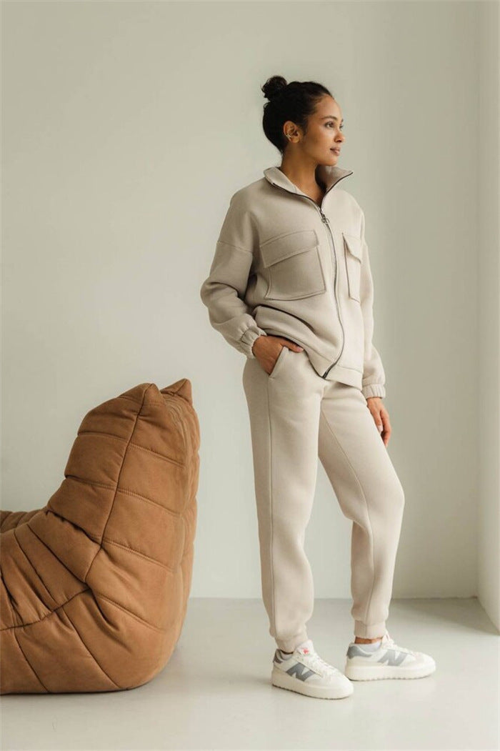 Women's comfortable fleece jacket with high collar and practical pockets. Chic and stylish.
