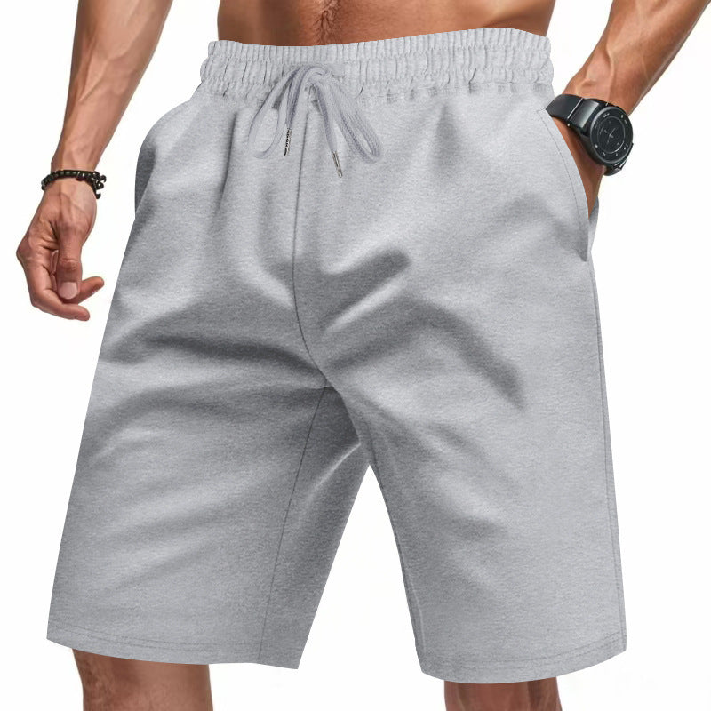 Pantalons de sport respirants pour hommes avec taille élastique et poches latérales Chic und Stil