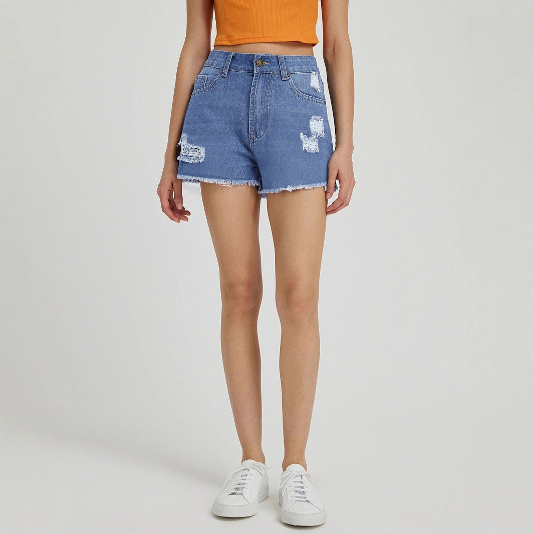 Shorts en denim détruit pour femmes avec ourlet effiloché Chic und Stil