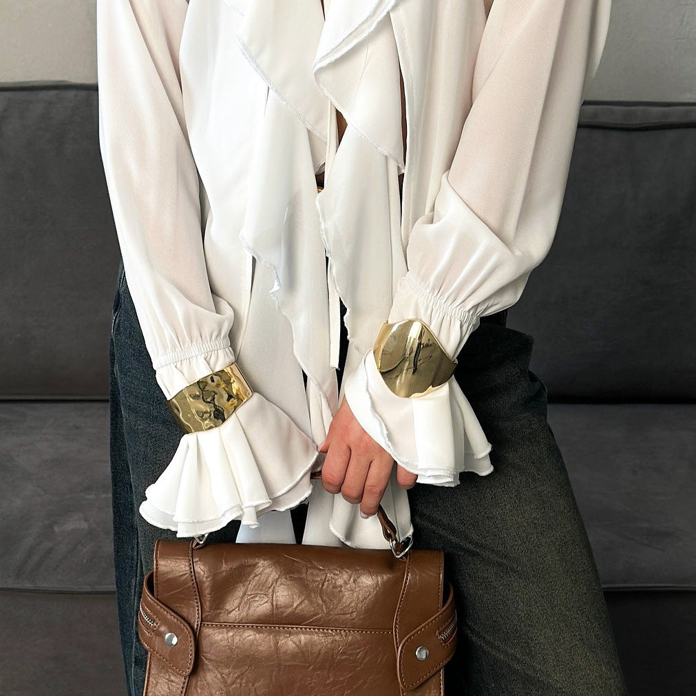 Blouse femme avec des volants volumineux et des poignets brillants Chic und Stil