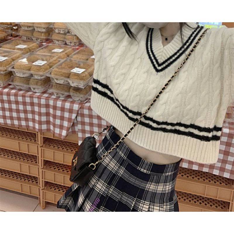 Pull en tricot à col en V et motif en relief pour dames Chic und Stil