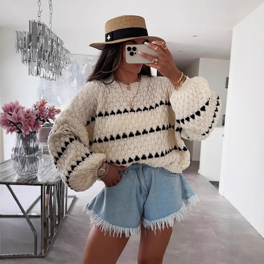 Pull féminin tendance avec une coupe ample et un design structuré Chic und Stil