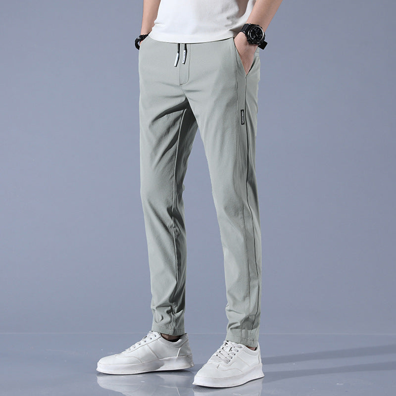 Men's sports pants with adjustable drawstring and zippered pockets on the sides Chic and Style