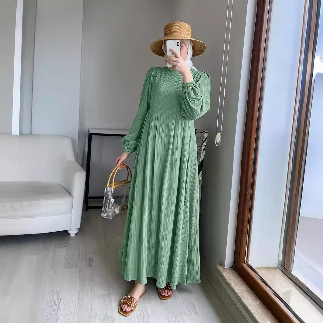 Robe maxi pour femmes avec un design plissé élégant et des manches bouffantes longues Chic und Stil