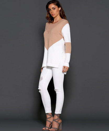 Pull féminin à la mode avec design géométrique et manches structurées Chic und Stil