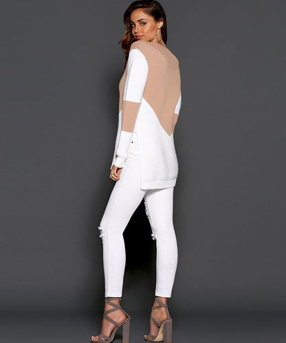 Pull féminin à la mode avec design géométrique et manches structurées Chic und Stil