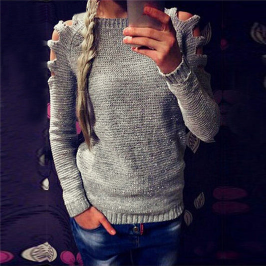Pull en tricot pour femmes avec un design innovant à découpe et des détails scintillants Chic und Stil