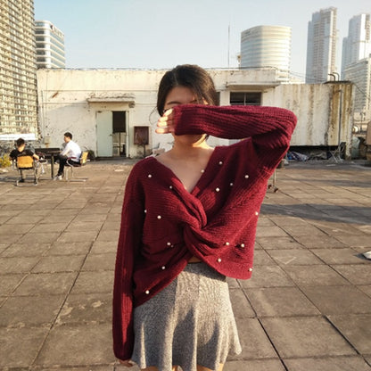 Pull en tricot pour femmes avec un design asymétrique au dos et des éléments ornés de perles Chic und Stil