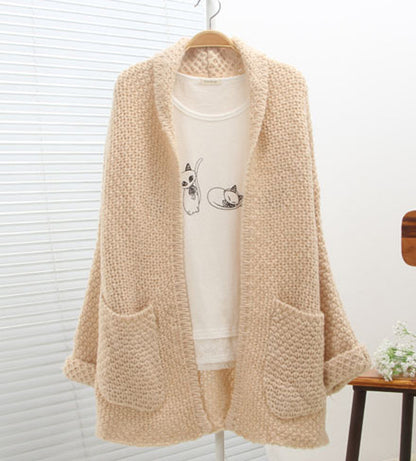 Cardigan en grosse maille pour femmes avec bords bruts et poches pratiques Chic und Stil