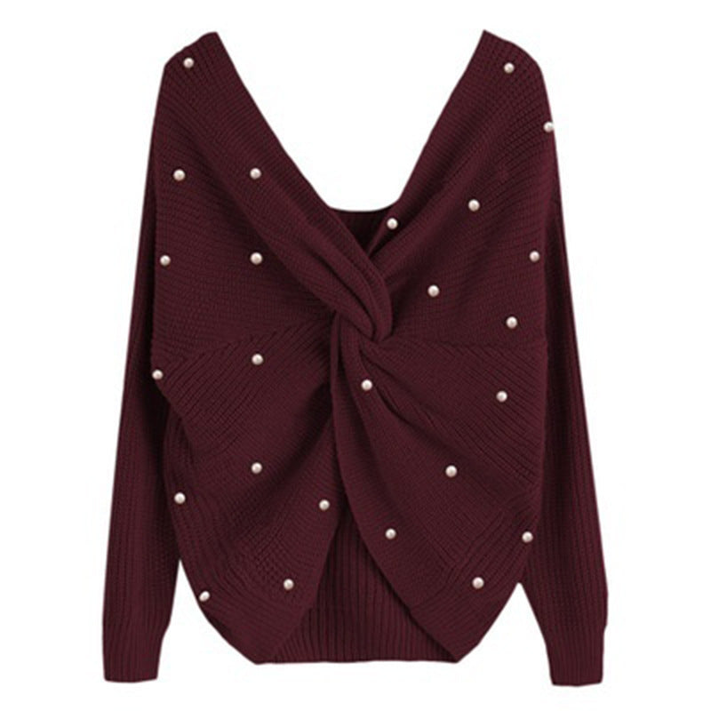 Pull femme en tricot avec détail torsadé et garniture en perles Chic und Stil