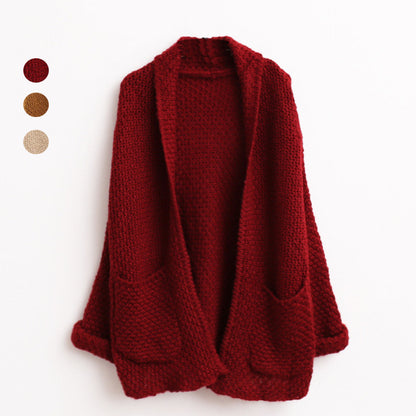 Cardigan en grosse maille pour femmes avec bords bruts et poches pratiques Chic und Stil