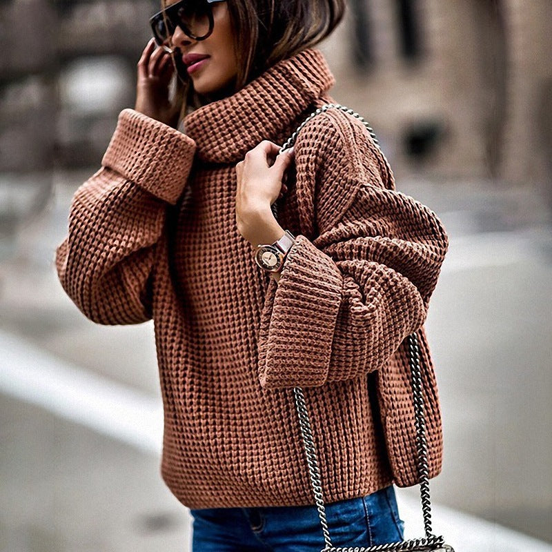 Pull en gros tricot pour femmes avec des manches volumineuses et un col haut Chic und Stil