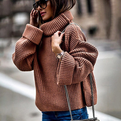 Pull en gros tricot pour femmes avec des manches volumineuses et un col haut Chic und Stil