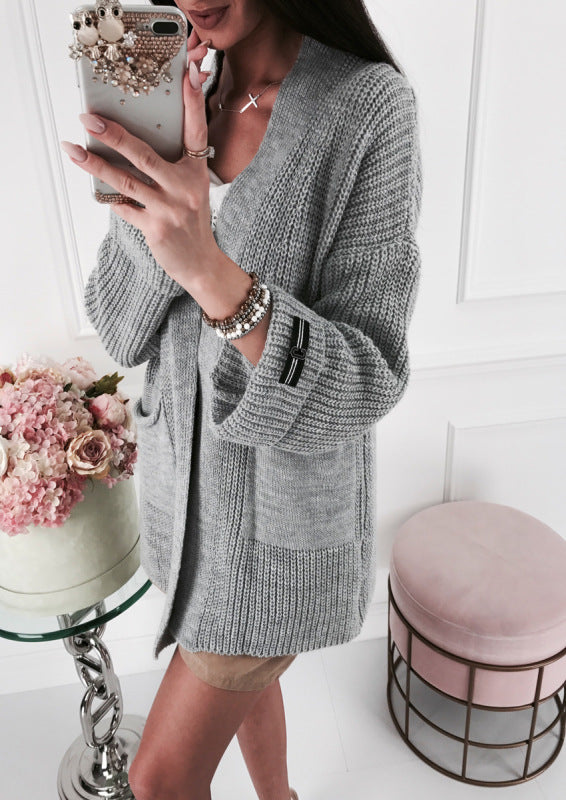 Dames cardigan en grosse maille avec des détails à la mode et des poches Chic und Stil