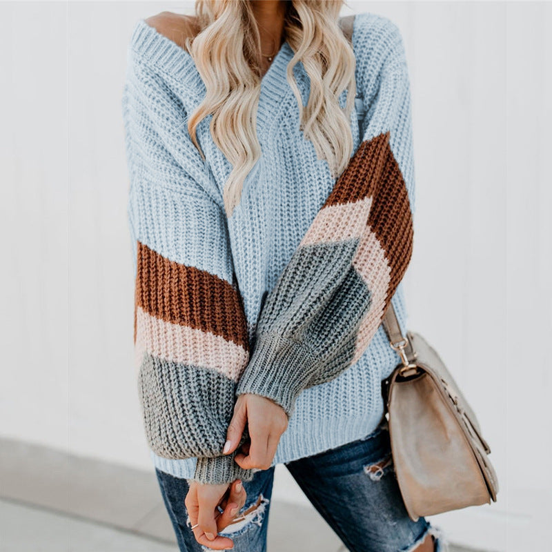 Pull en gros à col rond pour femmes avec un design moderne en blocs de couleur Chic und Stil