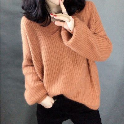 Women's knitted pullover with V-neck and voluminous sleeves Chic and Style
