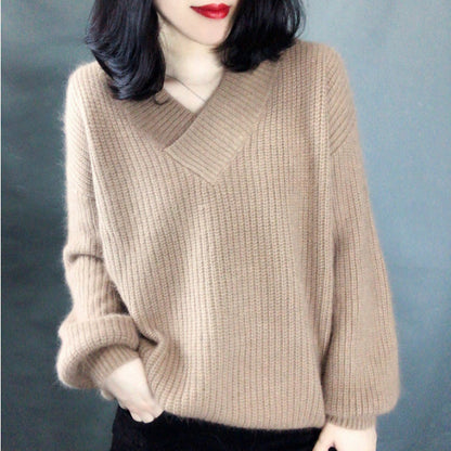 Women's knitted pullover with V-neck and voluminous sleeves Chic and Style