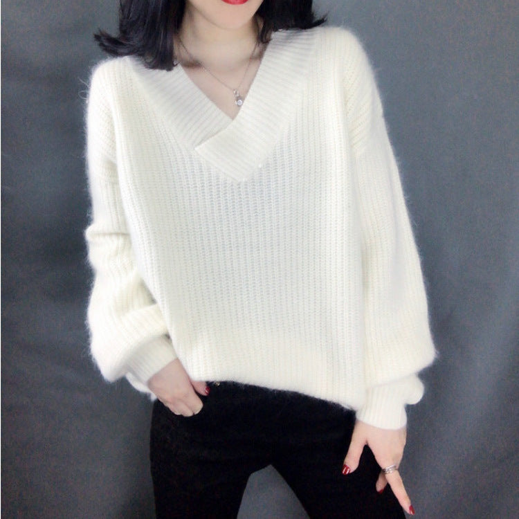Women's knitted pullover with V-neck and voluminous sleeves Chic and Style