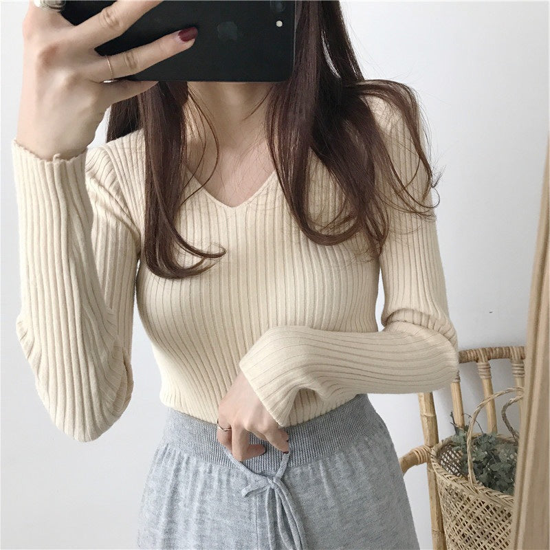 Chemisier à manches longues pour femmes avec décolleté en V et design côtelé texturé Chic und Stil