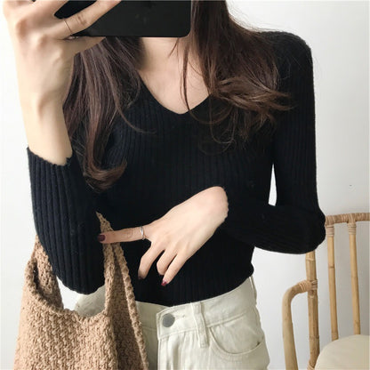 Chemisier à manches longues pour femmes avec décolleté en V et design côtelé texturé Chic und Stil